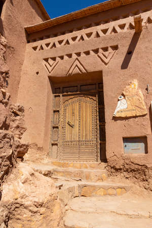 Ouarzazate, Morocco - 15 October, 2019: Entrance to Xaluca Ait Ben Haddou Guest House label at Ait Benhaddou Kasbah near Ouarzazate city Morocco. Traditional adobe architecture in North Africaのeditorial素材