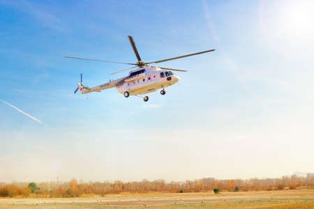 Krasnoyarsk, Russia - 22 October, 2021: ambulance helicopter taking off on city backgroundのeditorial素材
