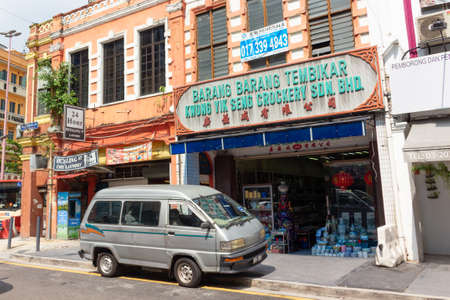 Kuala Lumpur, Malaysia - March 12, 2019: Traditional architecture in Chinatown of Kuala Lumpur, Malaysia. Two-story buildings with small shops on the ground floor and living rooms on the first floorのeditorial素材