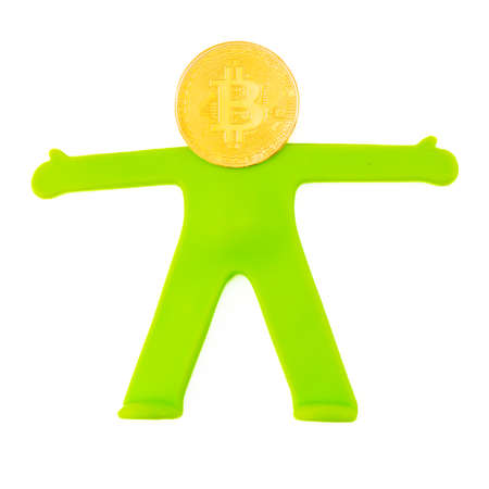 bitcoin headMan bitcoin head. Bright green plastic toy man with a gold coin Bitcoin instead of a head isolated on white background. Exchange trading, Digital currency, Cryptocurrency, Business and Banking conceptの写真素材
