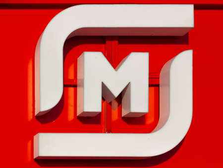 Krasnoyarsk, Russia - January 15, 2022: Close-up of logo of the Magnet or Magnet retail store. One of Russia's largest food retailers. food store signboardのeditorial素材