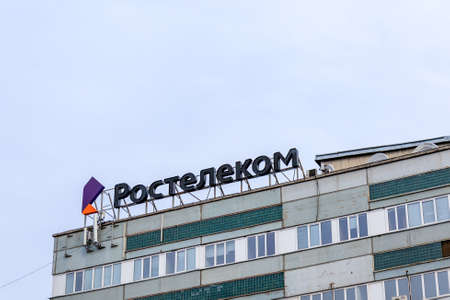 Krasnoyarsk, Russia - March 24, 2022: Rostelecom logo on facade of the building. Rostelecom is...