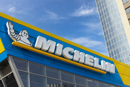 Krasnoyarsk, Russia - May 19, 2022: Close-up of Michelin logo on the facade of the building....