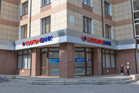 Krasnoyarsk, Russia - May 29, 2022: office of the bank Sovcombank with signboard on the facade of the building. Branch Business Service Centerのeditorial素材