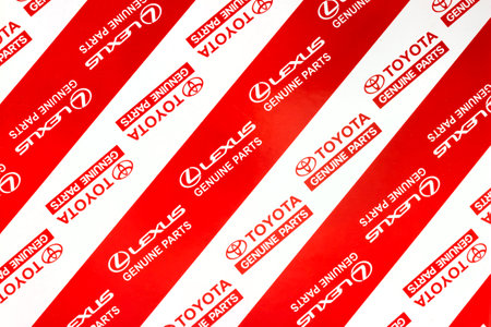 Krasnoyarsk, Russia - June 2, 2022: Red and white official wrapping paper for auto genuine parts...