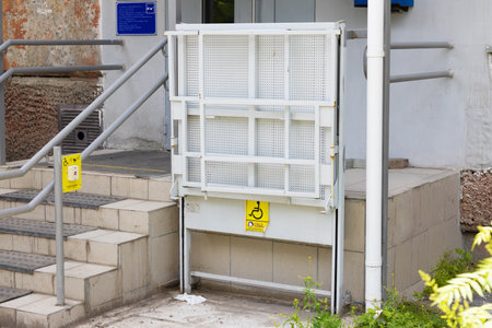 Krasnoyarsk, Russia - June 29, 2022: Russian post office entrance equipped with special lifting...