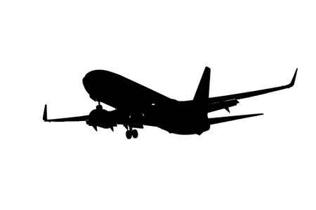 Black silhouette of a flying airplane on a white backgroundの写真素材