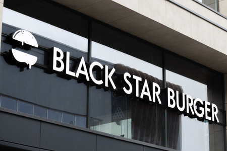 Moscow, Russia - 13 November, 2022: Logo above Black Star Burger fast food restaurant.のeditorial素材