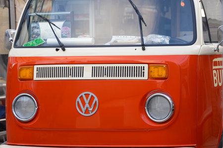 Krasnoyarsk, Russia - October 5, 2022: Close-up of volkswagen logo on the hood of a red car. Symbol on Volkswagen Transporter T2 minibus.のeditorial素材