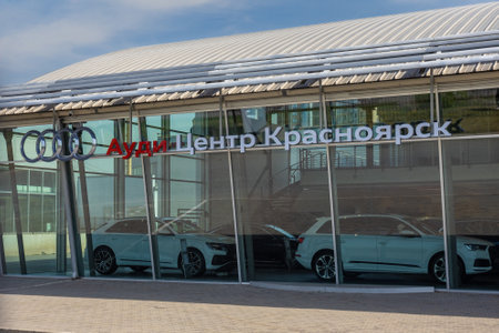 Krasnoyarsk, Russia - May 19, 2022: Audi logo from the Audi center in Krasnoyarsk, Russia. Cars in showroom of Audi dealershipのeditorial素材