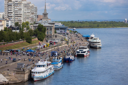 Krasnoyarsk, Russia - June 30, 2023: Row of tourist river ships in the passenger port of Krasnoyarsk. Motorships for tourist river cruises and excursions along the Yenisei Riverのeditorial素材