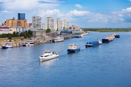 Krasnoyarsk, Russia - June 30, 2023: Parade of ships on the Yenisei River in Krasnoyarsk, Russia. Flag-decorated riverboats lined upのeditorial素材