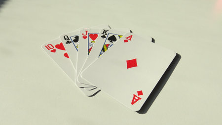 Playing cards on a white background, close-up. Selective focus.