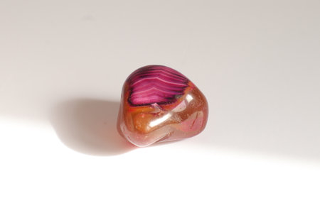 Amethyst on the white background. Macro photo with shallow depth of field.