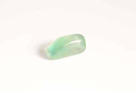 Emerald gemstone semigem geological mineral isolated on white backgroundの写真素材