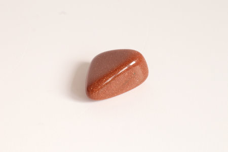 Sun stone Amber gemstone cabochon semigem geological mineral isolatedの写真素材