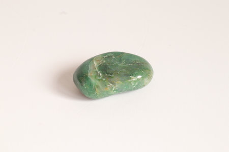 green tourmaline semigem geode crystals geological mineral isolatedの写真素材