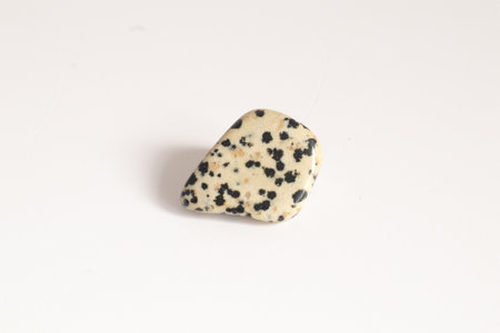 Pebble stone isolated on a white background. Macro photo.の写真素材