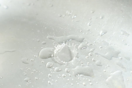 Water drops on a white background, close-up, macro.の写真素材