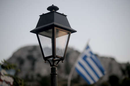 An ancient street lamp on the street at sunset. Greece, Kos Island.