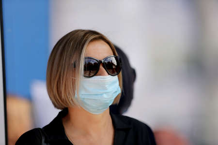Pupils and teachers wearing masks protect themselves from coronavirus when they return to school....