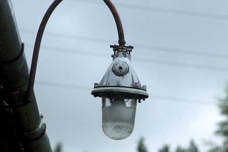 A classic old street lamp by the old roof Lithuania