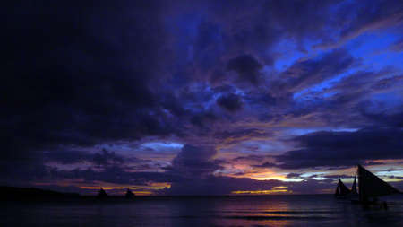 Sunset landscape. Sailboat on coast of Boracay island. Philippinesの写真素材