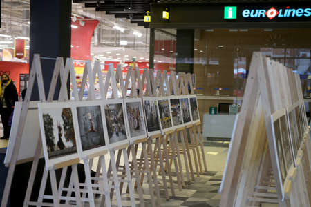 When galleries and exhibition halls were closed during the pandemic, photojournalist Algimantas Barzdzius organized a photography exhibition in the waiting area of Kaunas bus station.のeditorial素材