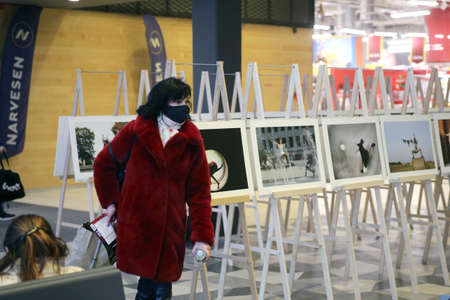 When galleries and exhibition halls were closed during the pandemic, photojournalist Algimantas Barzdzius organized a photography exhibition in the waiting area of Kaunas bus station.のeditorial素材