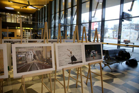 When galleries and exhibition halls were closed during the pandemic, photojournalist Algimantas Barzdzius organized a photography exhibition in the waiting area of Kaunas bus station.のeditorial素材