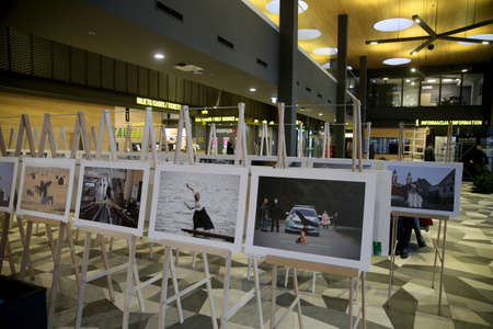 When galleries and exhibition halls were closed during the pandemic, photojournalist Algimantas Barzdzius organized a photography exhibition in the waiting area of Kaunas bus station.のeditorial素材