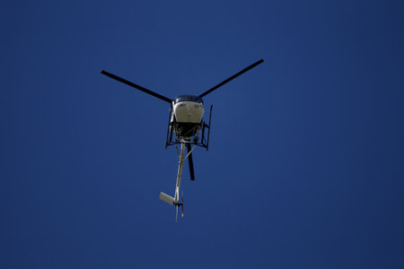 Schweizer 300C, LY-HDW Otto the helicopter flew over Kedainiu city. Lithuania 01 08 2020のeditorial素材