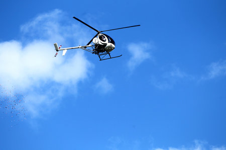 Schweizer 300C, LY-HDW Otto the helicopter flew over Kedainiu city. Lithuania 01 08 2020のeditorial素材
