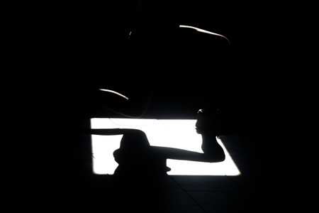 Fitness trainer details, shadow on the floorの写真素材