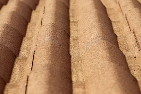 Old and news red roof tiles close upの写真素材