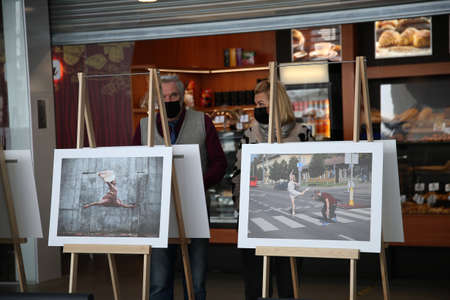 When galleries and exhibition halls were closed during the pandemic, photojournalist Algimantas Barzdzius organized a photography exhibition in the waiting area of Vilkaviskis bus station. 08 03 2021のeditorial素材