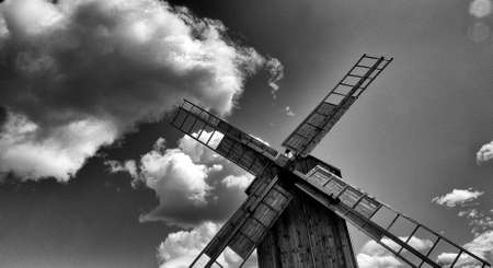 A windmill against a background of blue sky and clouds on the island of Saaremaa.の写真素材