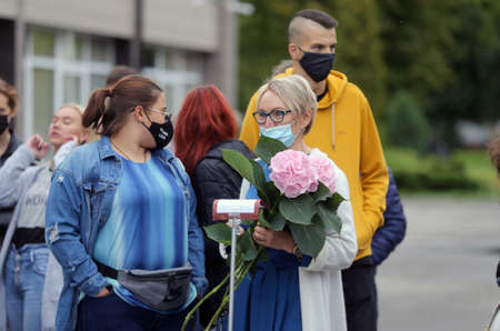 Pupils and teachers wearing masks protect themselves from coronavirus when they return to school. After the pandemic, students return to school, preparing for the new school year. Kedainiai Vocational Training Center. Lithuaniaのeditorial素材