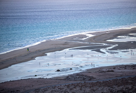 Patterns at low water in the sand of the beach near Costa Calma on Fuerteventura. This island in the Atlantic ocean is one of the Canary islands belonging to Spainの写真素材