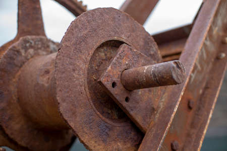 Details of a parts the moving parts of a rusty machine mechanical gearの写真素材