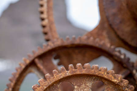 Details of a parts the moving parts of a rusty machine mechanical gearの写真素材