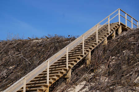 Wooden stairs on the sand dunes