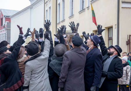 Street theater performance "Signatories go to take photos" The event was dedicated to the 104th anniversary of the restoration of the Lithuanian state and the 100th anniversary of the establishment of the Kedainiai Regional Museum. Kedainiai 02 16 2022のeditorial素材