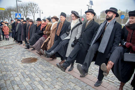 Street theater performance "Signatories go to take photos" The event was dedicated to the 104th anniversary of the restoration of the Lithuanian state and the 100th anniversary of the establishment of the Kedainiai Regional Museum. Kedainiai 02 16 2022のeditorial素材