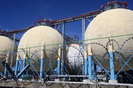 Sphere tank and blue sky at the fertilizer plant. The Lifosa plant belongs to the Russian concern...