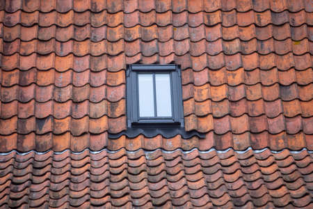 Detail of a roof made with tiles from an old mediterranean villageの写真素材