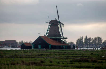 Windmills used for manufacturing of different products in Zannse Schans, Holland 04 25 2022の写真素材