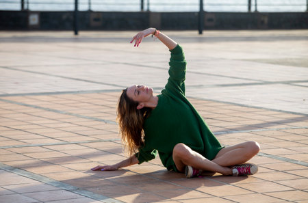 Young stylish woman in a city streetの写真素材