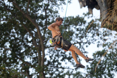Mountaineers exercise rock climbing at Beach Bay in Krabi, Thailand 03 12 2019のeditorial素材