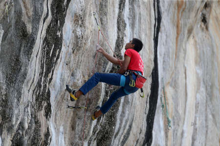Mountaineers exercise rock climbing at Beach Bay in Krabi, Thailand 03 12 2019のeditorial素材